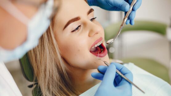 beautiful girl sitting dentist s office